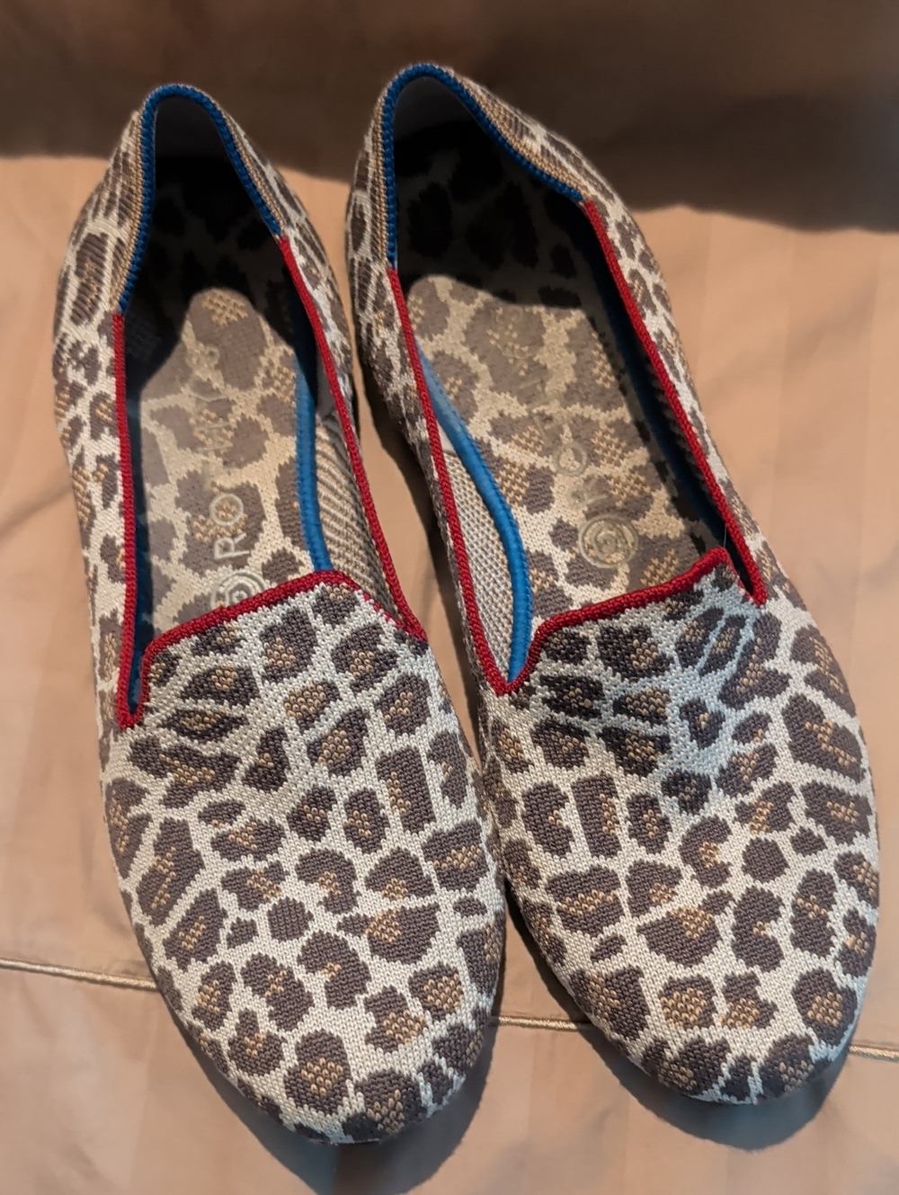 Rothy's Leopard-Print Flats with Red Trim and Blue Lining